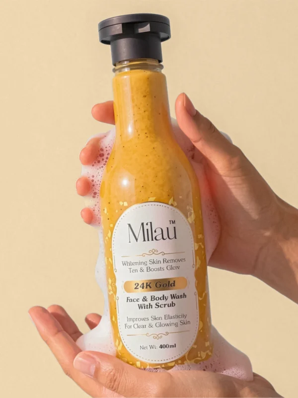 Milau 24k gold face and body wash with scrub in hand exfoliating glowing skin product