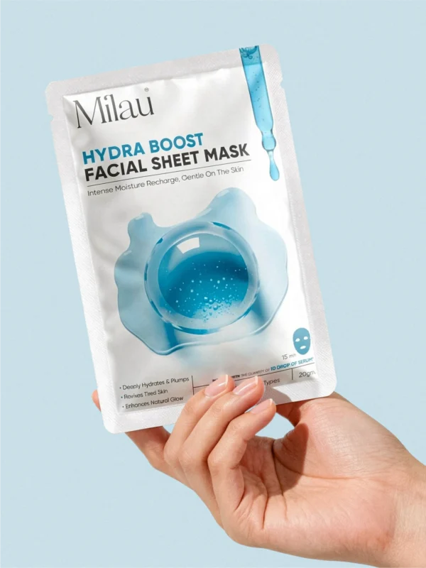 hand holding hydra boost sheet mask hydrating skincare glowing skin milau