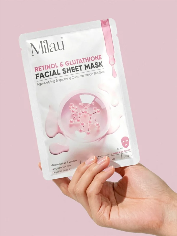 hand holding retinol glutathione sheet mask anti aging skincare milau