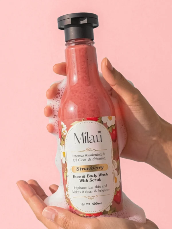 Strawberry face wash foam in hand exfoliating scrub glowing skin cleanser milau