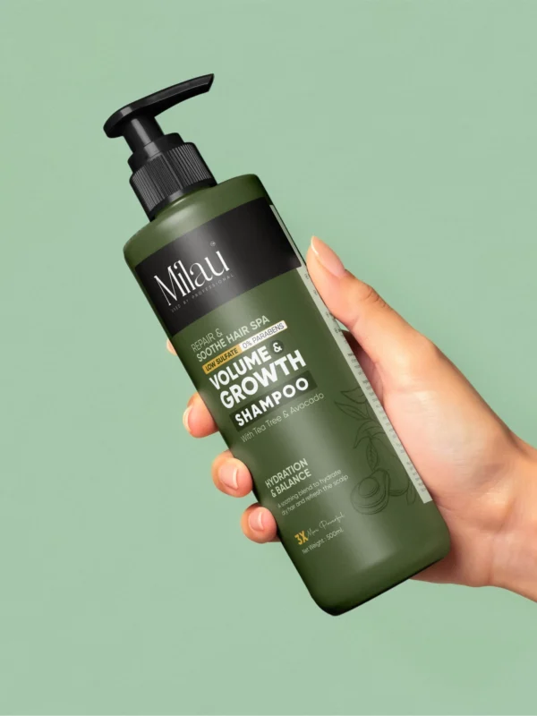 hand holding hair growth shampoo with smooth hair background for scalp care and volume boost