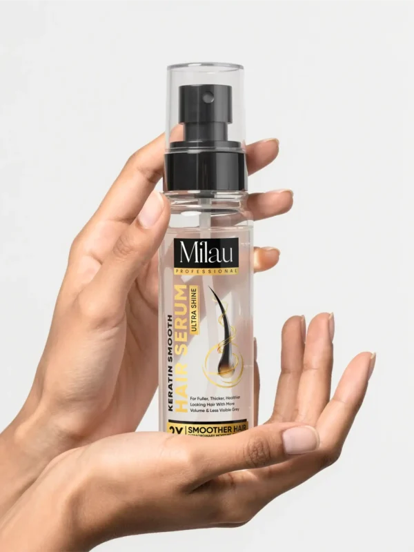 hand holding keratin hair serum lightweight non greasy frizz control serum